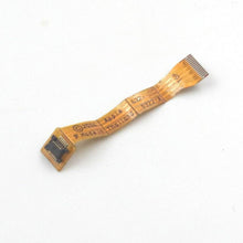 Load image into Gallery viewer, Wooden flex cable connector with printed circuit traces and metal contact pins for mobile device repair.
